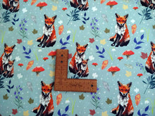Load image into Gallery viewer, Woodland Foxes on teal jersey 0.88 M PIECE
